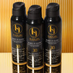 Make It Hybrid™ SPF 50 lifestyle – Black woman wearing lightweight sunscreen for melanin-rich skin